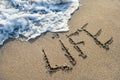 Inscription on the sand life, beach, recreation, sea water Royalty Free Stock Photo