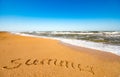 Inscription on sand summer near stormy sea wave Royalty Free Stock Photo