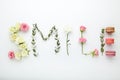 Inscription Smile by flowers