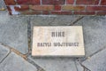 An inscription stone next to the sculpture of Nike by Bazyli Wojtowicz in the Cytadela Park, Poznan, Poland