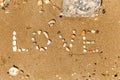 Inscription stones in the sand the word love