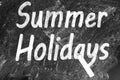 Inscription Summer Holidays on blackboard. School`s Out Royalty Free Stock Photo