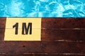 Inscription of the swimming pool depth of 1 meter