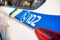 Inscription 102 - telephone number of the police on a patrol car Royalty Free Stock Photo