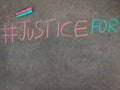 The inscription text on the grey board, #JUSTICE FOR Royalty Free Stock Photo