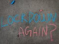 The inscription text on the grey board, Lockdown again Royalty Free Stock Photo