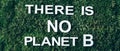 Inscription There Is No Planet B on moss, green grass background. Top view. Copy space. Banner. Biophilia concept Royalty Free Stock Photo