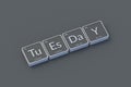 Inscription tuesday on metallic buttons