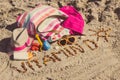 Inscription vitamin D, accessories for relax and childrens playing on sand at beach. Prevention of vitamin D deficiency Royalty Free Stock Photo