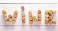 The inscription wine corks on white wooden background Royalty Free Stock Photo