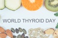 Inscription World Thyroid Day and best ingredients for healthy thyroid. White background