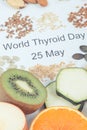 Inscription World Thyroid Day 25 May and best ingredients for healthy thyroid. White background