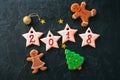 Inscription 2018 year from icing gingerbread cookies with 2018 n Royalty Free Stock Photo