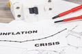 Inscriptions crisis and inflation with electric fuse, work tools and electrical installation plan. High prices of building or