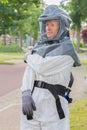 Insect fighter wears airtight work suit