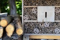 An insect hotel for bees, wasps and other insects made of wood