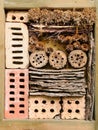 Insect hotel in garden Royalty Free Stock Photo