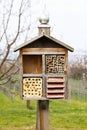 Insect hotel house in the free nature and garden Royalty Free Stock Photo