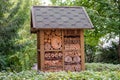 Insect hotel house in garden Royalty Free Stock Photo