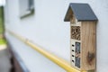 Insect hotel installed on house wall