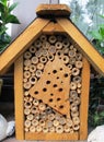Insect hotel for wild bees and other insects. made of wood and b