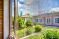 Insect net on window - Protection against mosquito in house Royalty Free Stock Photo