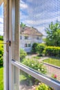Insect net on window - Protection against mosquito in house Royalty Free Stock Photo