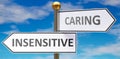 Insensitive and caring as different choices in life - pictured as words Insensitive, caring on road signs pointing at opposite Royalty Free Stock Photo