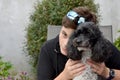 Best friends, teenage boy and his harlequin poodle