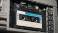 Insert an Audio Cassette in a Tape Recorder and Play, Eject, Close-Up