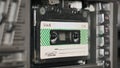 Insert an Audio Cassette in a Tape Recorder and Play, Eject, Close-Up