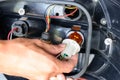 Insert the Light bulb to tail lamp Royalty Free Stock Photo