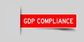 Inserted red sticker label with word GDP Abbreviation good distribution practice Compliance on gray background