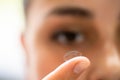 Inserting Contact Lens In Eye Royalty Free Stock Photo