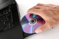 Inserting a DVD Royalty Free Stock Photo