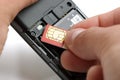 Inserting a sim card Royalty Free Stock Photo
