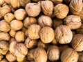 Inshell walnuts. Background made of nuts. Photowall-paper Royalty Free Stock Photo