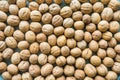 Inshell walnuts background. View from above. Royalty Free Stock Photo
