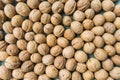 Inshell walnuts background. View from above. background of nuts Royalty Free Stock Photo