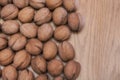 Inshell walnuts on a wooden table