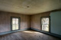 Abandoned Farmhouse with Vintage Windows and Wood Floors and Green and Brown Wallpaper Royalty Free Stock Photo