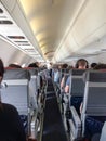 Inside airplane with passengers