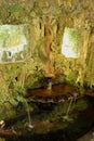 Impressive water fountain inside a grotto in Pontevedra Spain,