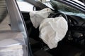 Inside Automobile, Airbag exploded at a car after the accident. Driver and Passenger Air Bags Deployed Royalty Free Stock Photo