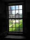 Shaker Round Stone Barn interior window panes Royalty Free Stock Photo