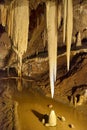 Inside A Big Limestone Cave With An Underground Lake