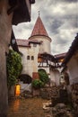 Inside Bran Castle in Transylvania. Inner yard in a summer rainy day. The dark Castle of Count Dracula Brasov, Romania Royalty Free Stock Photo