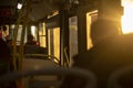 Inside bus is light of sun. People in transport Royalty Free Stock Photo