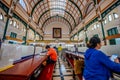 Bustling interior of Saigon Central Post Office, Vietnam Royalty Free Stock Photo