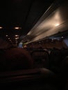 Inside cabin of airplane at night dark Royalty Free Stock Photo